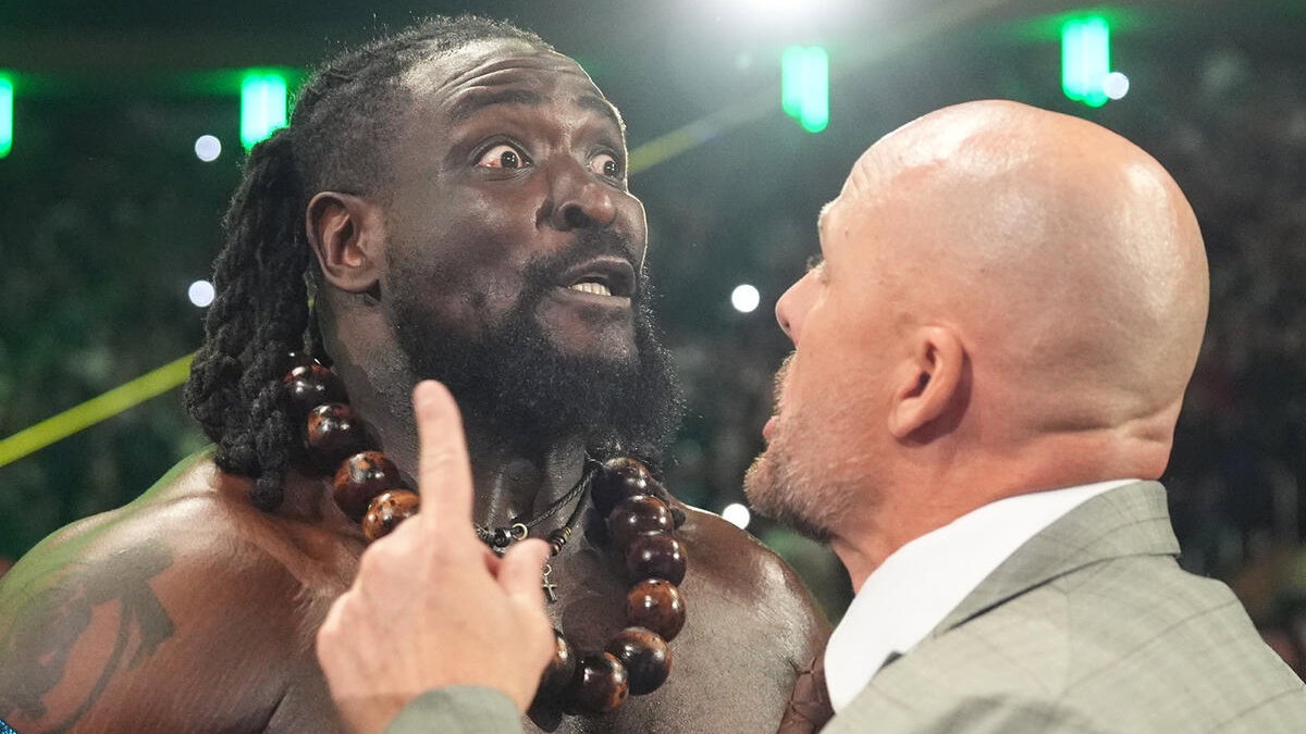 WWE's Oba Femi being held back by Adam Pearce on Raw