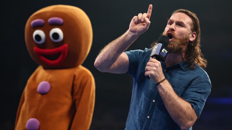 Sami Zayn with the Gingerbread Man on WWE SmackDown
