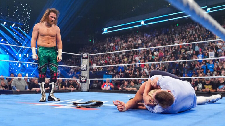 WWE star Sami Zayn watching on as GUNTHER attacks Cody Rhodes on WWE SmackDown