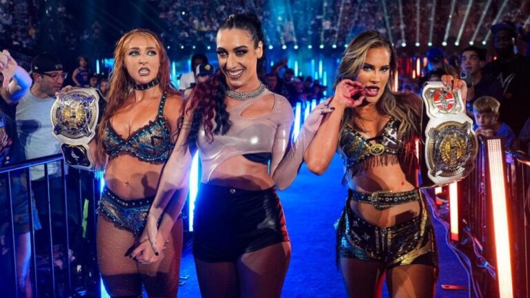 WWE Women's Tag Team Champions Lainey Reid and Fallon Henley, alongside Jacy Jayne as Fatal Influence