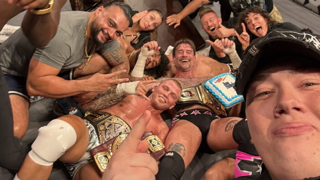CM Punk and various WWE NXT stars following his live event appearance in Petersburg, Virginia