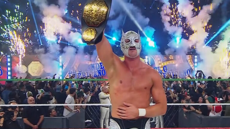 WWE star El Grande Americano with the AAA Mega Championship