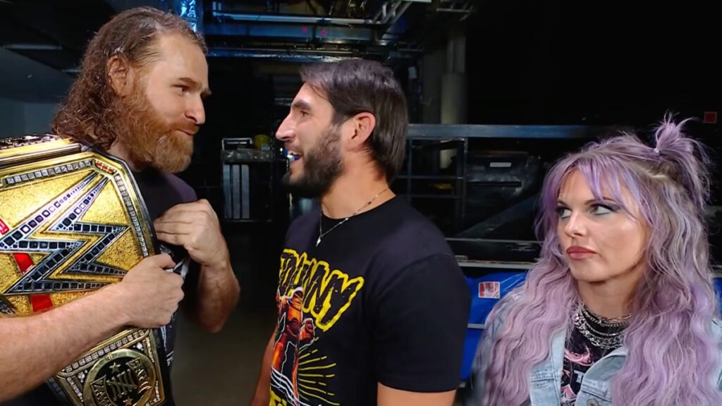 Sami Zayn, Johnny Gargano and Candice LeRae on WWE SmackDown.