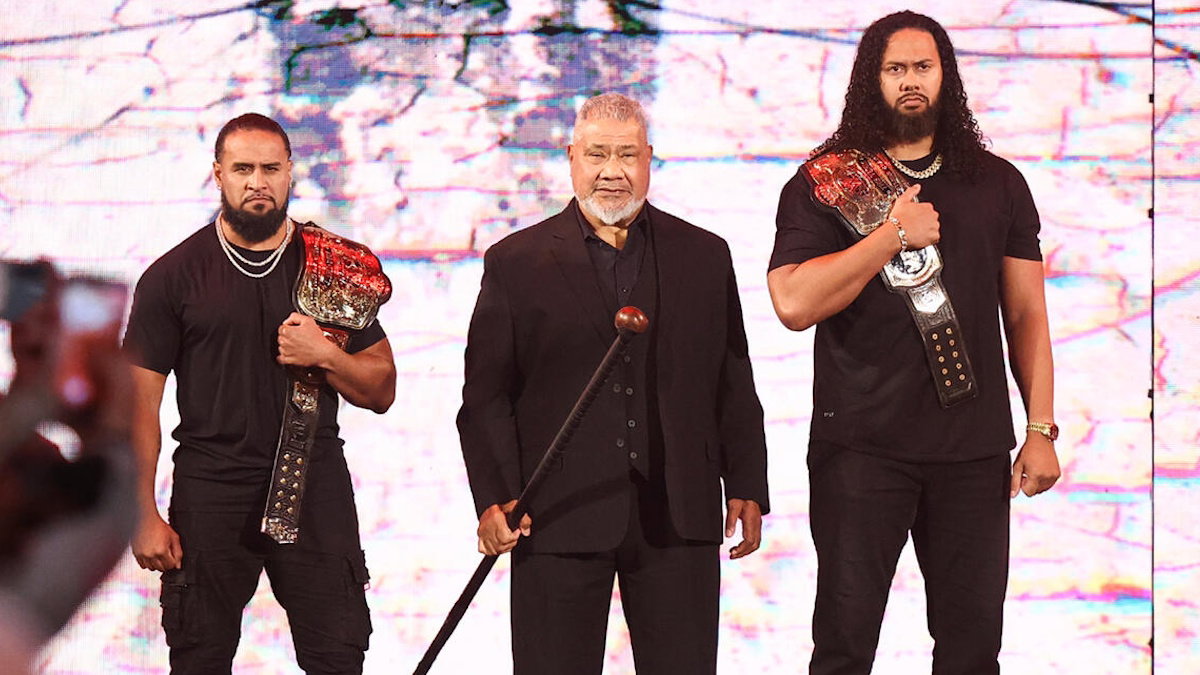 WWE Tag Team Champions Tama Tonga and Talla Tonga with Haku, The MFTs