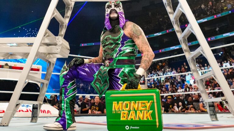 Penta with the WWE Money in the Bank briefcase
